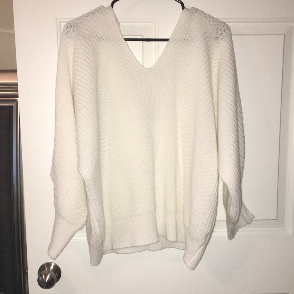 White v neck to off the shoulder sweater